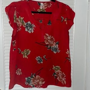 Red floral blouse
